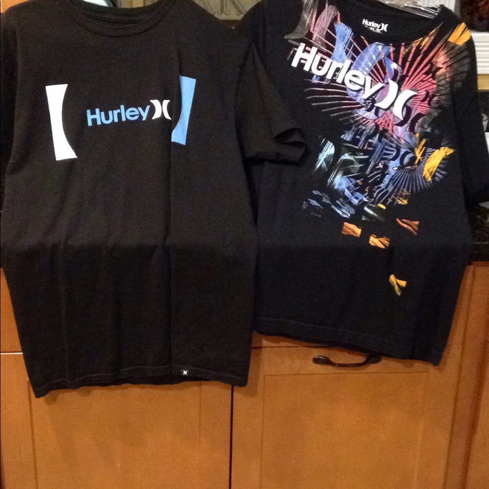 2 black Hurley t-shirts.